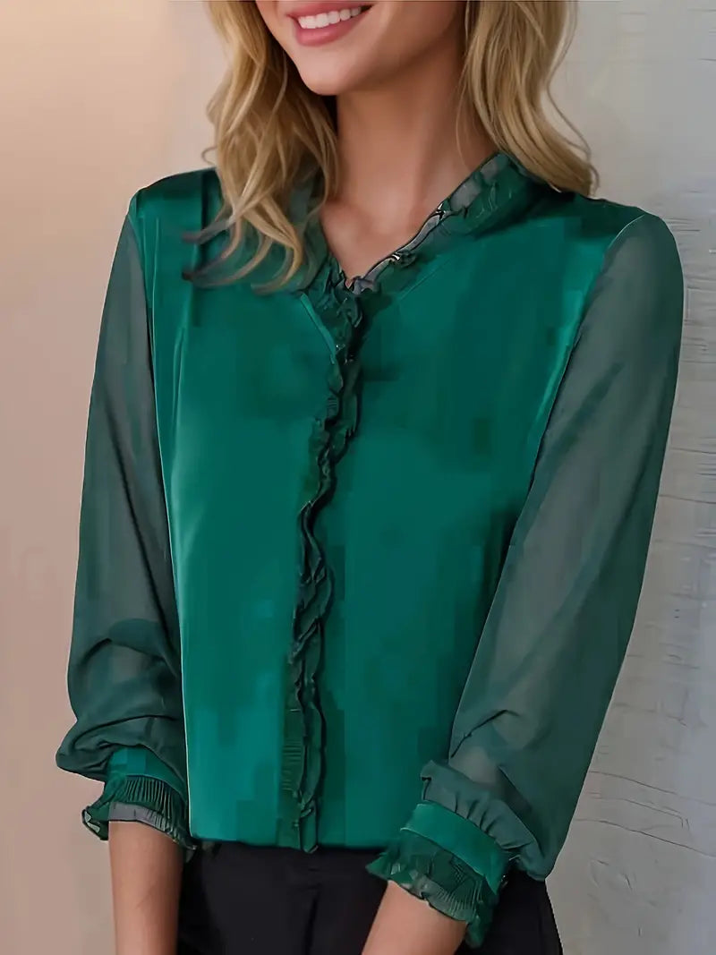 Lumina Wear Isabella elegant ruffle blouse with flowing sleeves, featuring delicate ruffle details and a stylish, feminine design.