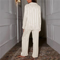 Elegant Satin Stripe Pajama Set by Lumina Wear featuring button front top and wide-leg pants, perfect for comfortable sleepwear.