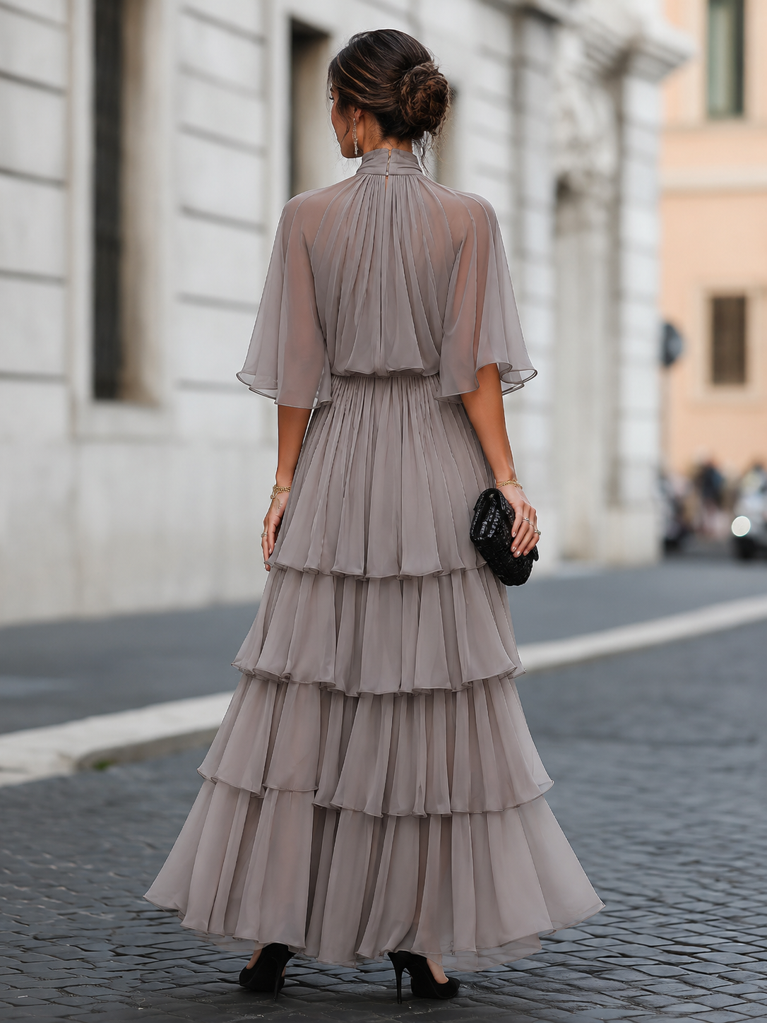Isabella Lumina Wear Verona elegant tiered pleated maxi dress with sheer cape overlay, flowing fabric and sophisticated design
