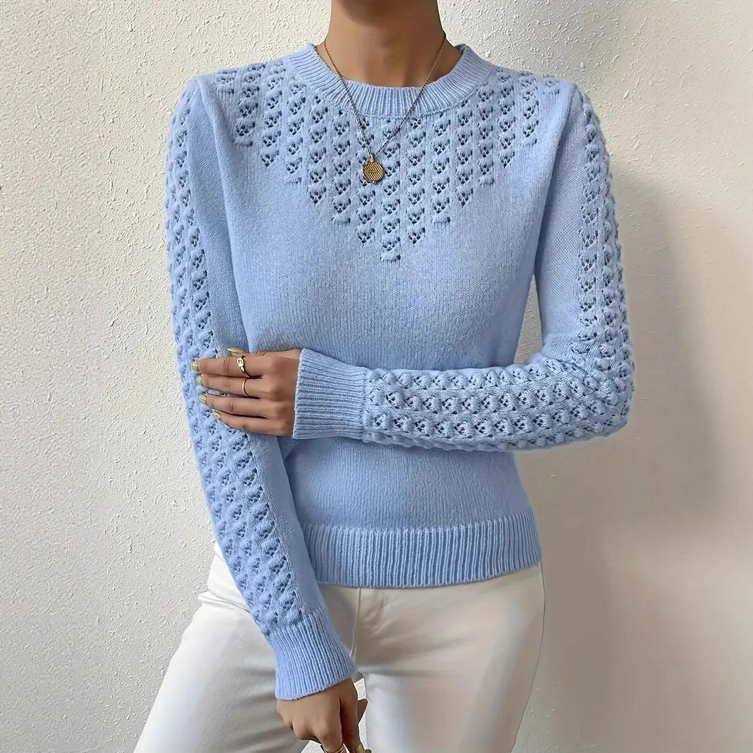 Lumina Wear Isabella fitted pointelle knit jumper with puff shoulders, showcasing a close-up of the stylish sweater design.
