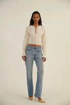 Fitted ribbed cropped cardigan with button closure from Lumina Wear, styled on a woman, in a neutral color.