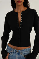 Light gray fitted ribbed cropped cardigan with button closure from Lumina Wear's Isabella collection for women.
