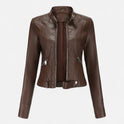 Isabella Lumina vegan leather fitted structured jacket with waist belt, showcasing sleek design and tailored fit.
