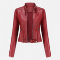 Isabella fitted vegan leather jacket with waist belt by Lumina Wear, showing structured design and sleek black finish.