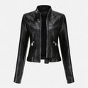 Fitted vegan leather jacket with waist belt from Lumina Wear's Isabella collection, featuring structured design and sleek style.