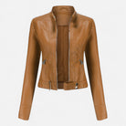 Isabella vegan leather fitted jacket with waist belt from Lumina Wear, featuring structured design and sleek black finish.