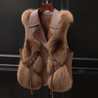 Lumina Wear Isabella fluffy vest with lapel collar, waist tie, and faux fur trim, shown on a model.