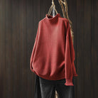 Light grey Isabella Lumina Wear high-neck textured knit sweater with a relaxed fit, showcasing its cozy, stylish design.