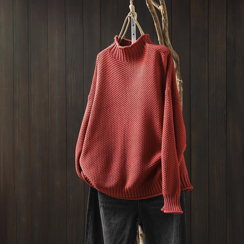 Light grey Isabella Lumina Wear high-neck textured knit sweater with a relaxed fit, showcasing its cozy, stylish design.