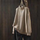 Lumina Wear Isabella high-neck textured knit sweater with a relaxed fit, showcasing cozy fabric and stylish design.