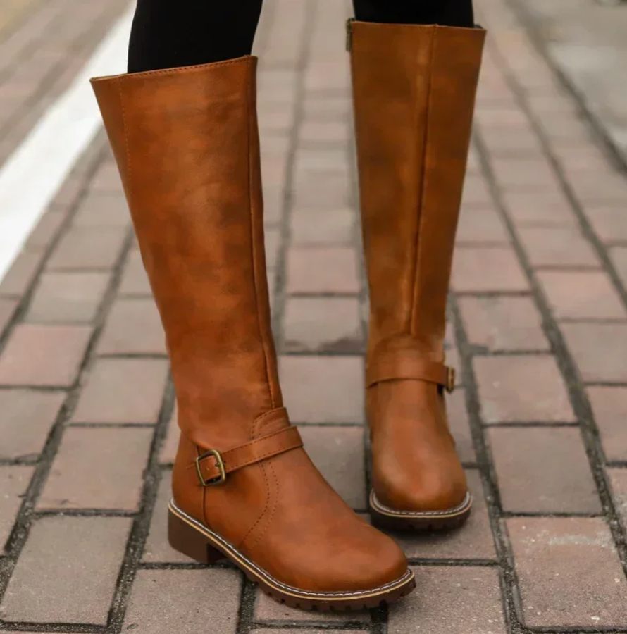 Lumina Wear Isabella women's knee-high buckle strap boots with side zipper, stylish black leather footwear for women.