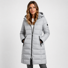 Lumina Wear Isabella lightweight quilted hooded puffer jacket with fitted silhouette, shown on a model.