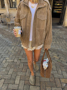Isabella oversized boxy utility jacket by Lumina Wear featuring flap pockets and a relaxed fit in a neutral color.