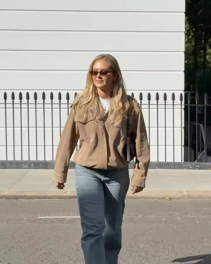 Isabella Lumina Wear oversized boxy utility jacket with flap pockets, shown in a stylish fit with functional pocket details.