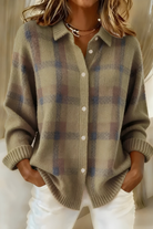 Cream and brown plaid knit cardigan sweater by Lumina Wear with oversized fit and relaxed style, displayed on a hanger.