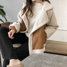 Lumina Wear Isabella oversized plush cream shearling jacket with asymmetric zip, featuring a cozy, plush texture and stylish design.