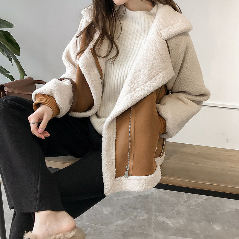 Lumina Wear Isabella oversized plush cream shearling jacket with asymmetric zip, featuring a cozy, plush texture and stylish design.