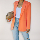 Light gray oversized relaxed blazer with notched lapel from Lumina Wear's Isabella collection, shown on a mannequin.