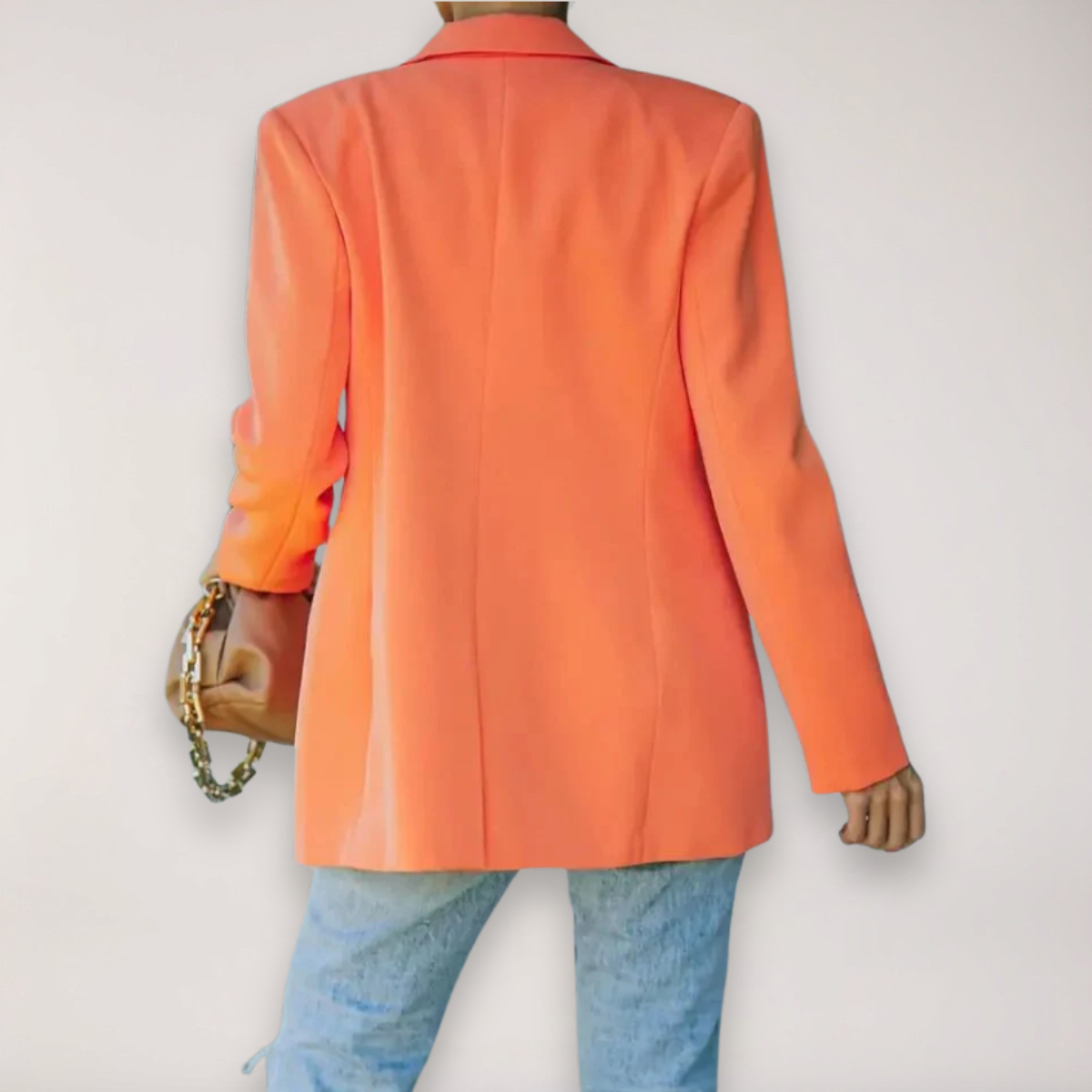 Light gray oversized blazer with notched lapel from Lumina Wear's Isabella collection, relaxed fit and stylish design.