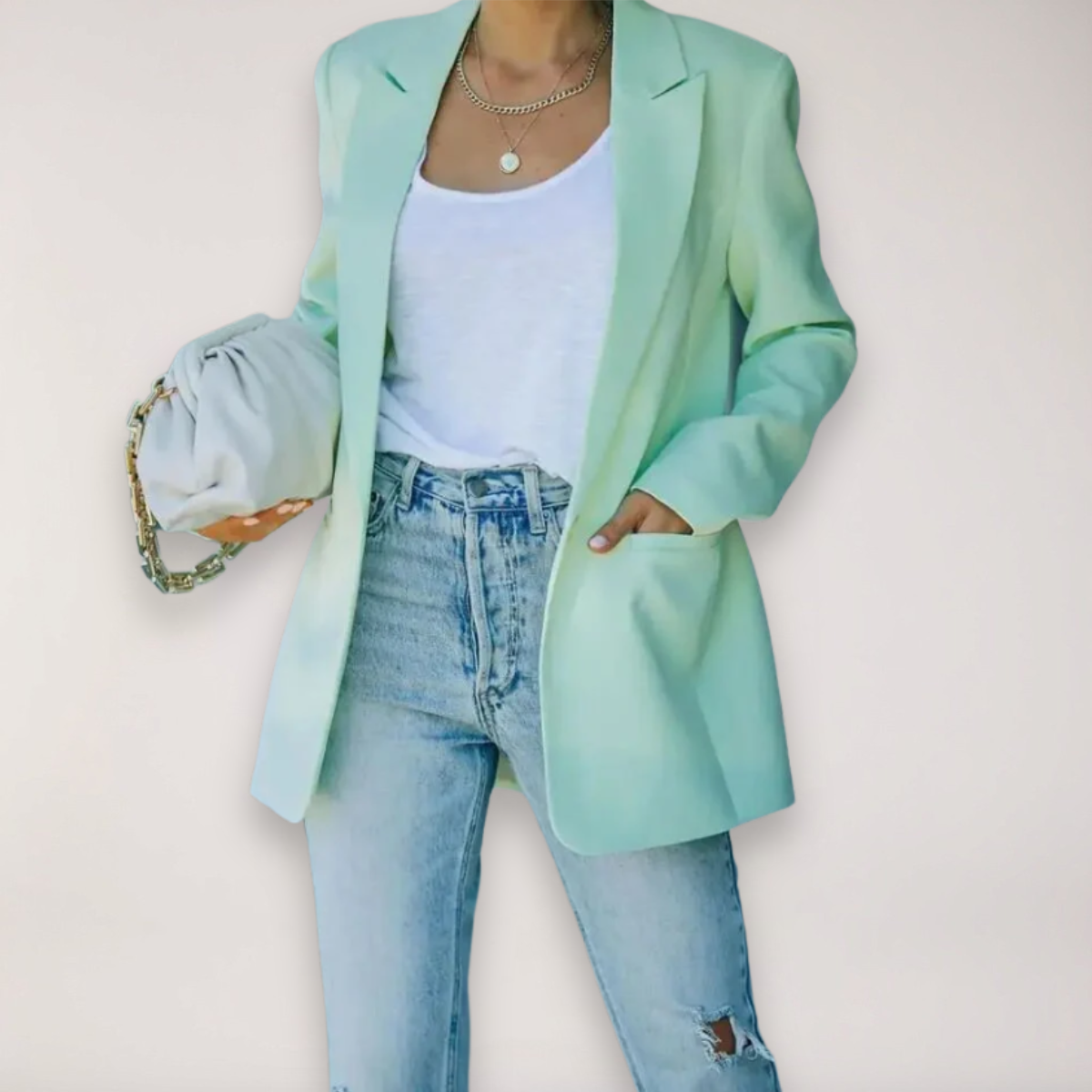 Light gray oversized blazer with notched lapel from Lumina Wear's Isabella collection, relaxed fit and tailored for a stylish look.