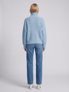 Light gray oversized textured waffle-knit turtleneck sweater for women by Lumina Wear, featuring a cozy and relaxed fit.