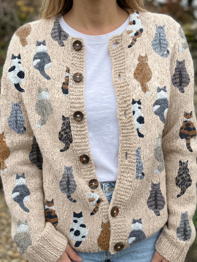 Light gray women's cardigan sweater by Lumina Wear featuring a playful cat print and button front design.