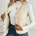 Lumina Wear Isabella quilted snap-front vest with cozy sherpa lining, stylish and warm outerwear for cold weather.