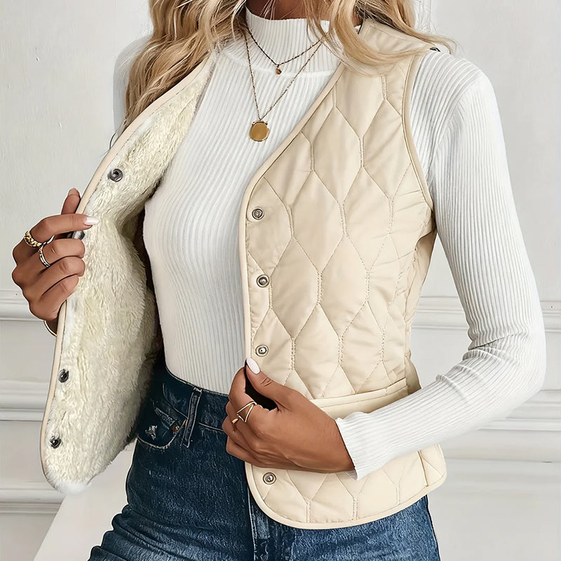 Lumina Wear Isabella quilted snap-front vest with Sherpa lining, showcasing the stylish outer layer and cozy interior.