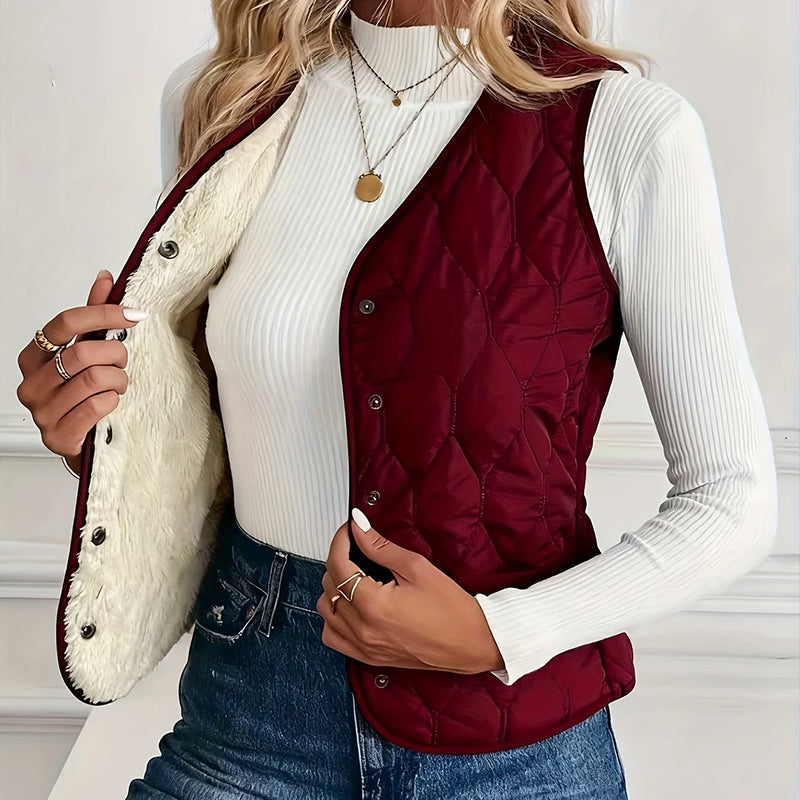 Lumina Wear Isabella quilted snap-front vest with sherpa lining, showcasing a stylish, warm sleeveless outerwear piece.