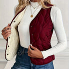 Lumina Wear Isabella quilted snap-front vest with sherpa lining, showcasing a stylish, warm sleeveless outerwear piece.