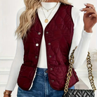 Lumina Wear Isabella quilted snap-front vest with sherpa lining, showcasing warm and stylish outerwear perfect for layering.