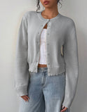 White Isabella Lumina relaxed cropped cardigan sweater with ribbed trim, featuring a cozy, casual fit and stylish detailing.