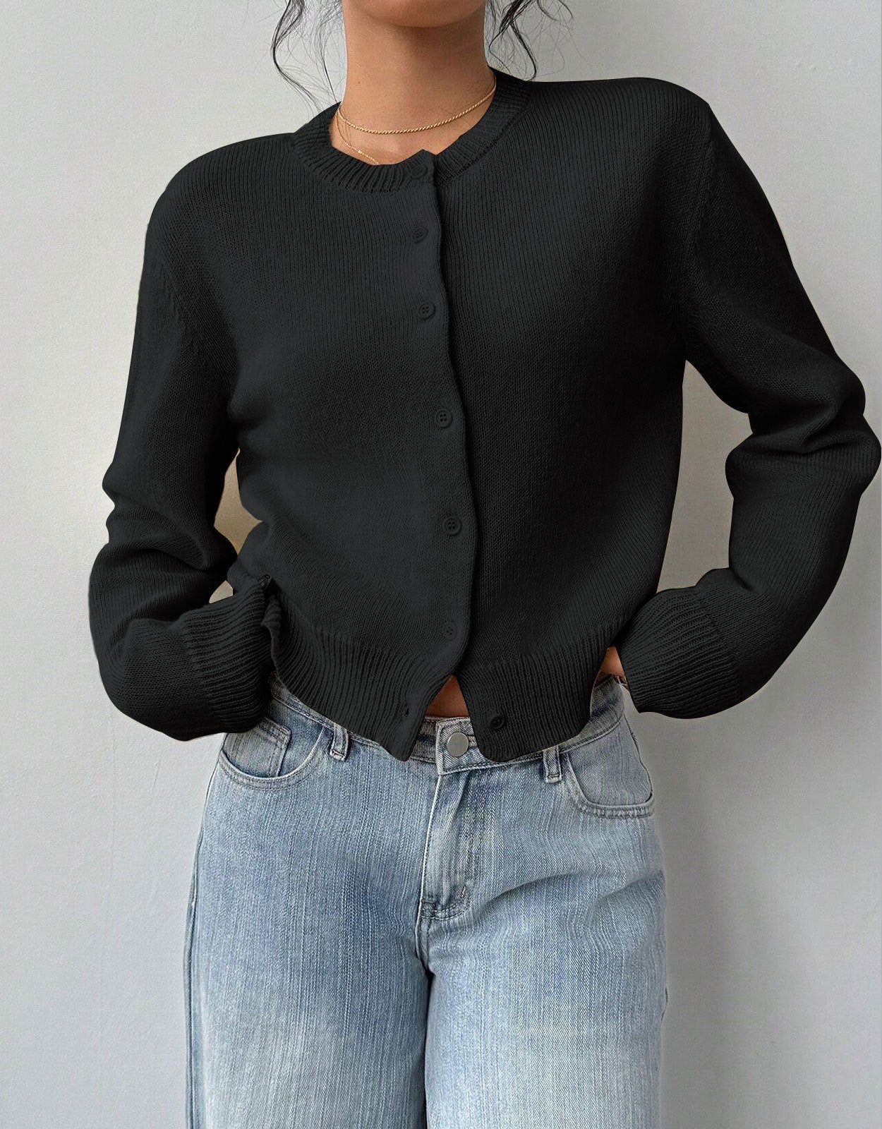 Relaxed cropped white cardigan sweater with ribbed trim from Lumina Wear, featuring a soft knit and casual fit.