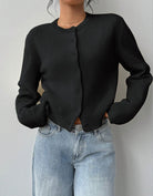 Relaxed cropped white cardigan sweater with ribbed trim from Lumina Wear, featuring a soft knit and casual fit.