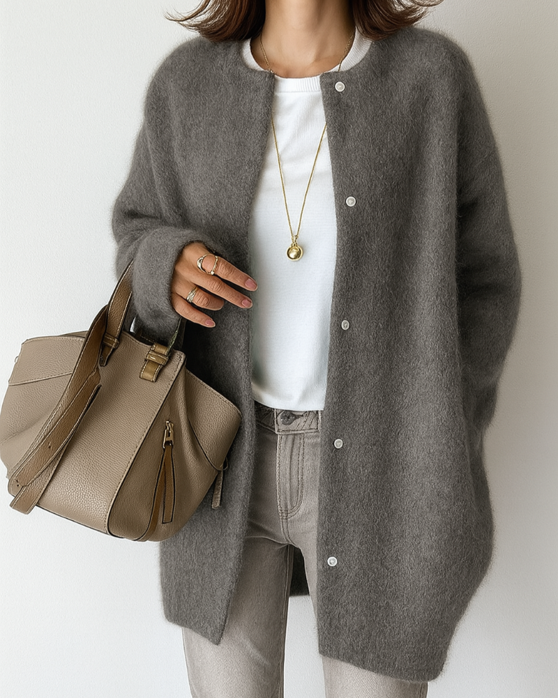 Lumina Wear Isabella women's long cardigan with relaxed fit and patch pockets, shown in a cozy, draped style.