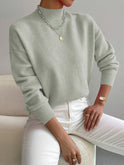 Lumina Wear Isabella relaxed fit soft knit sweater with mock turtleneck, featuring cozy fabric and casual style.