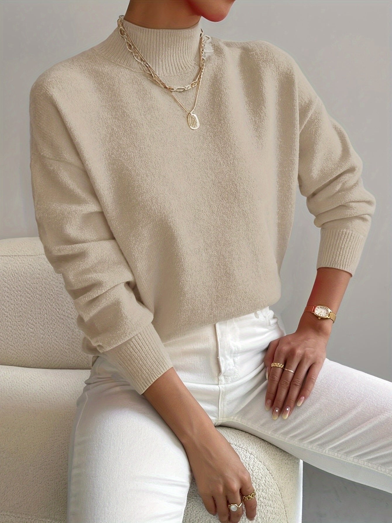 Lumina Wear Isabella relaxed fit soft knit sweater with mock turtleneck, shown in a cozy, casual fit on a model.