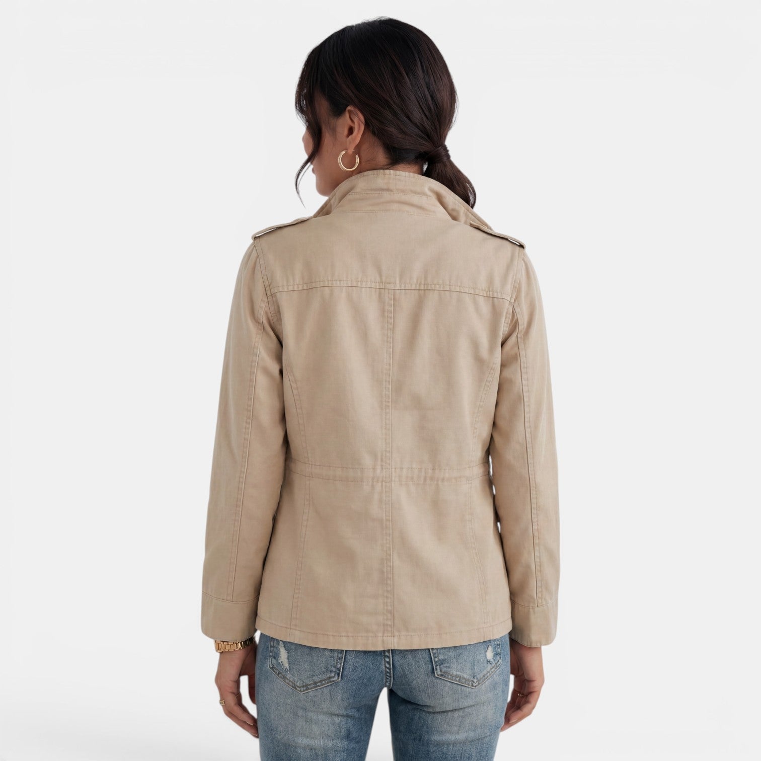 Lumina Wear Isabella relaxed fit utility jacket with adjustable collar, shown in a casual outdoor setting.