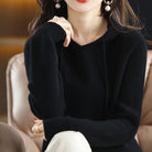 Lumina Wear Isabella women's hooded knit sweater with relaxed fit and soft textured fabric, perfect for casual wear.
