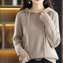 Lumina Wear Isabella relaxed hooded knit sweater with soft textured fabric, shown in a cozy, casual fit.