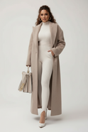 Isabella Lumina Wear oversized wool-blend overcoat with shawl collar, relaxed fit, and neutral color, displayed on a mannequin.