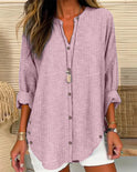 Light blue and white striped Lumina Wear Isabella relaxed blouse with button front, showcasing a casual and stylish fit.