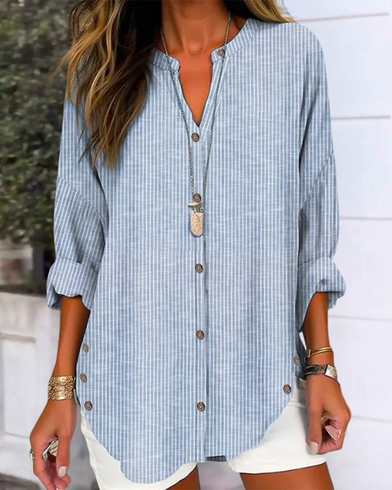 Isabella Lumina relaxed striped blouse with button front, casual fit, featuring blue and white horizontal stripes and long sleeves.