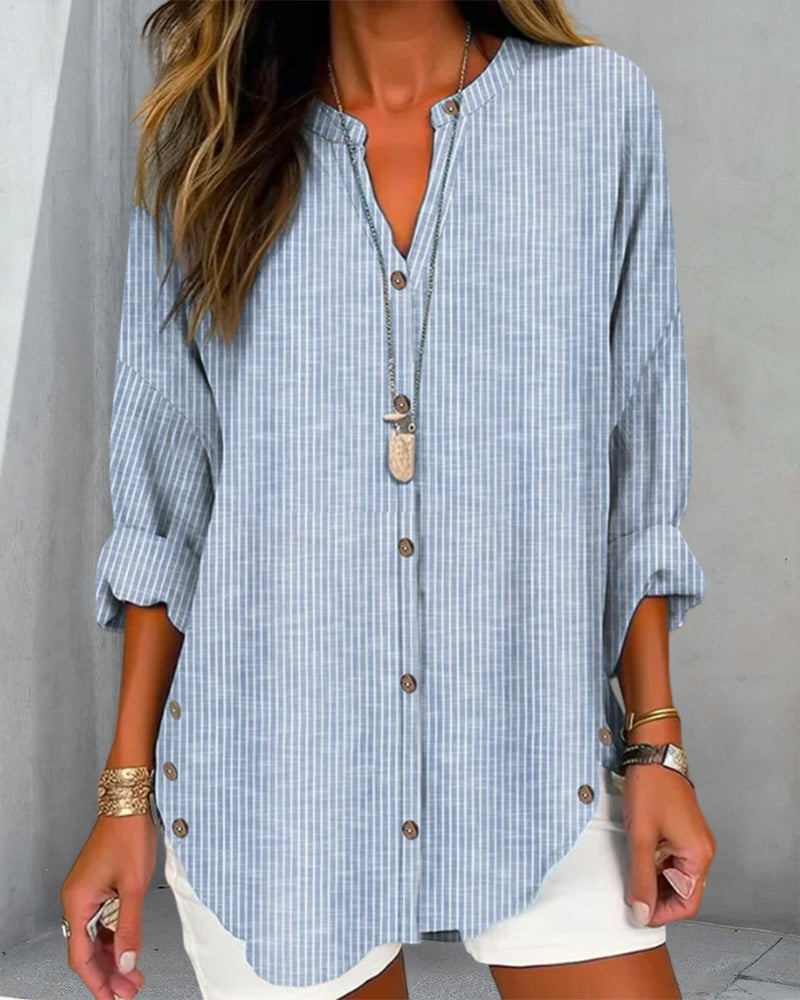 Relaxed striped blouse with button front by Lumina Wear, featuring a comfortable fit and stylish design.