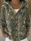 Black ribbed cardigan sweater with button front from Lumina Wear, featuring a cozy, fitted design and stylish knit texture.