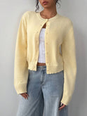 Lumina Wear Isabella soft knit cropped cardigan for women with relaxed fit and ribbed trim, shown in a cozy, light-colored sweater style.