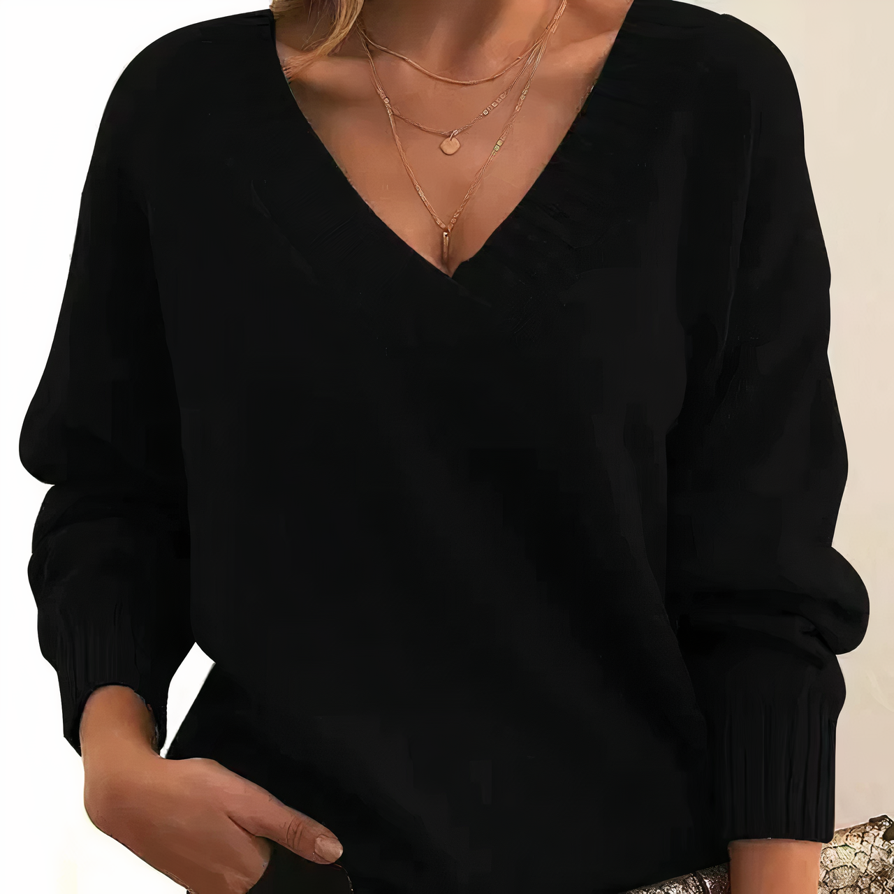 Lightweight Lumina Wear Isabella V-neck sweater with relaxed fit and ribbed trims, soft fabric, perfect for casual wear.