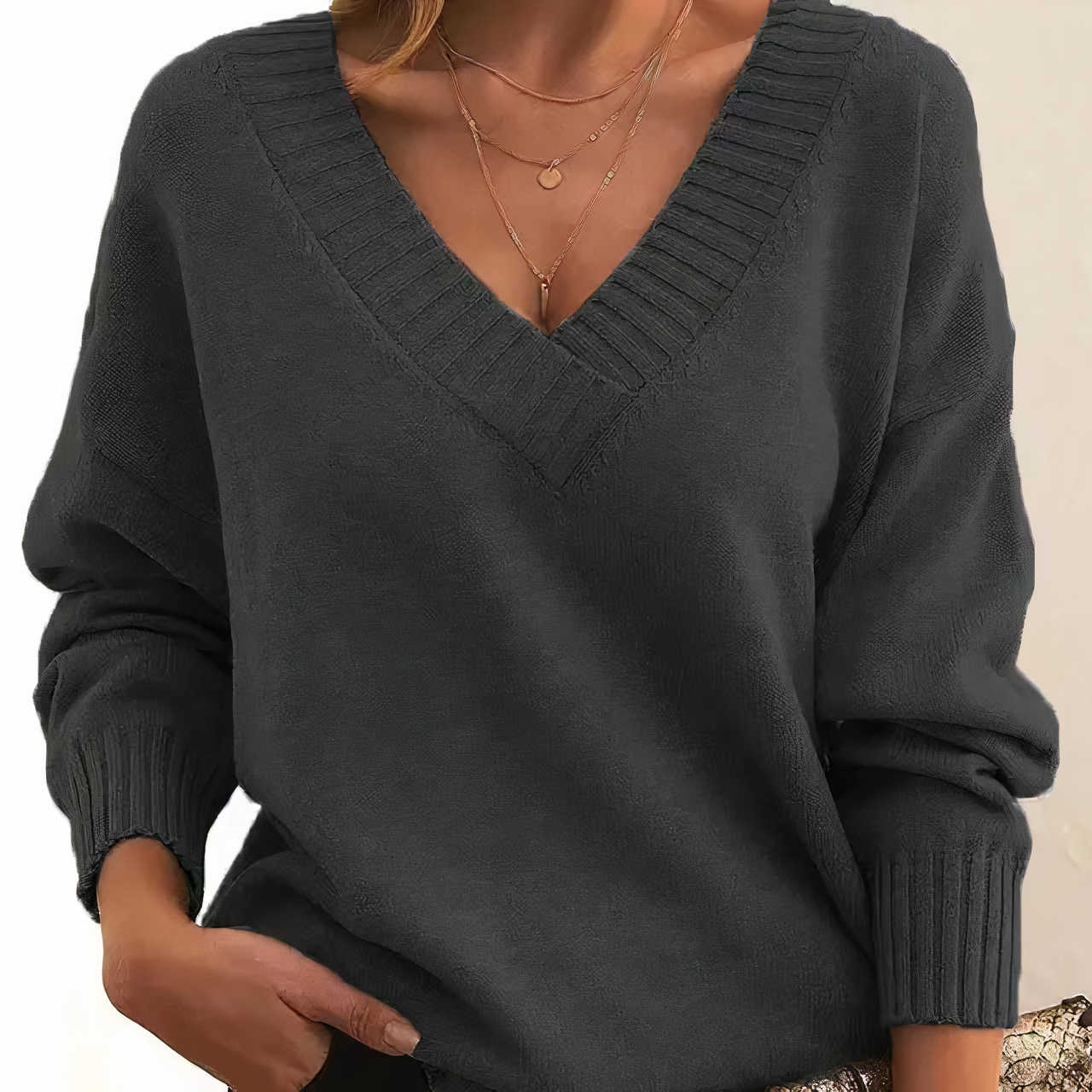 Lightweight Lumina Wear Isabella V-neck sweater with soft relaxed fit and ribbed trims, shown in a cozy, casual style.