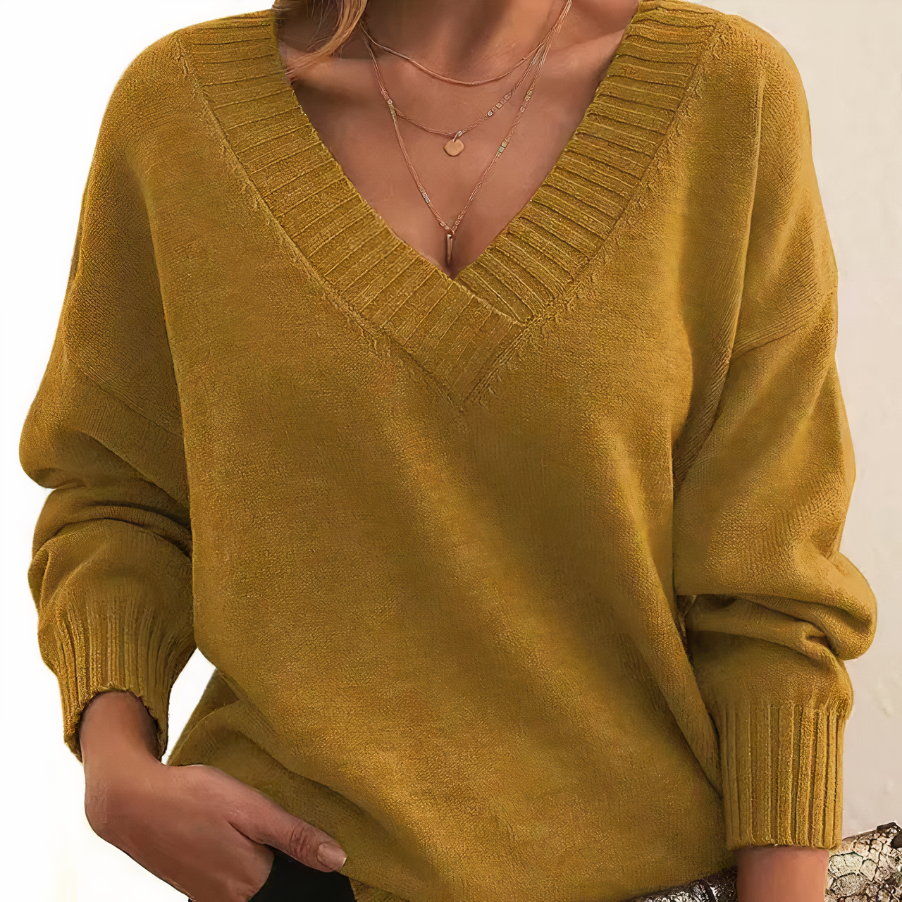 Lightweight Isabella Lumina Wear relaxed fit V-neck sweater with ribbed trims, soft fabric, and casual style.