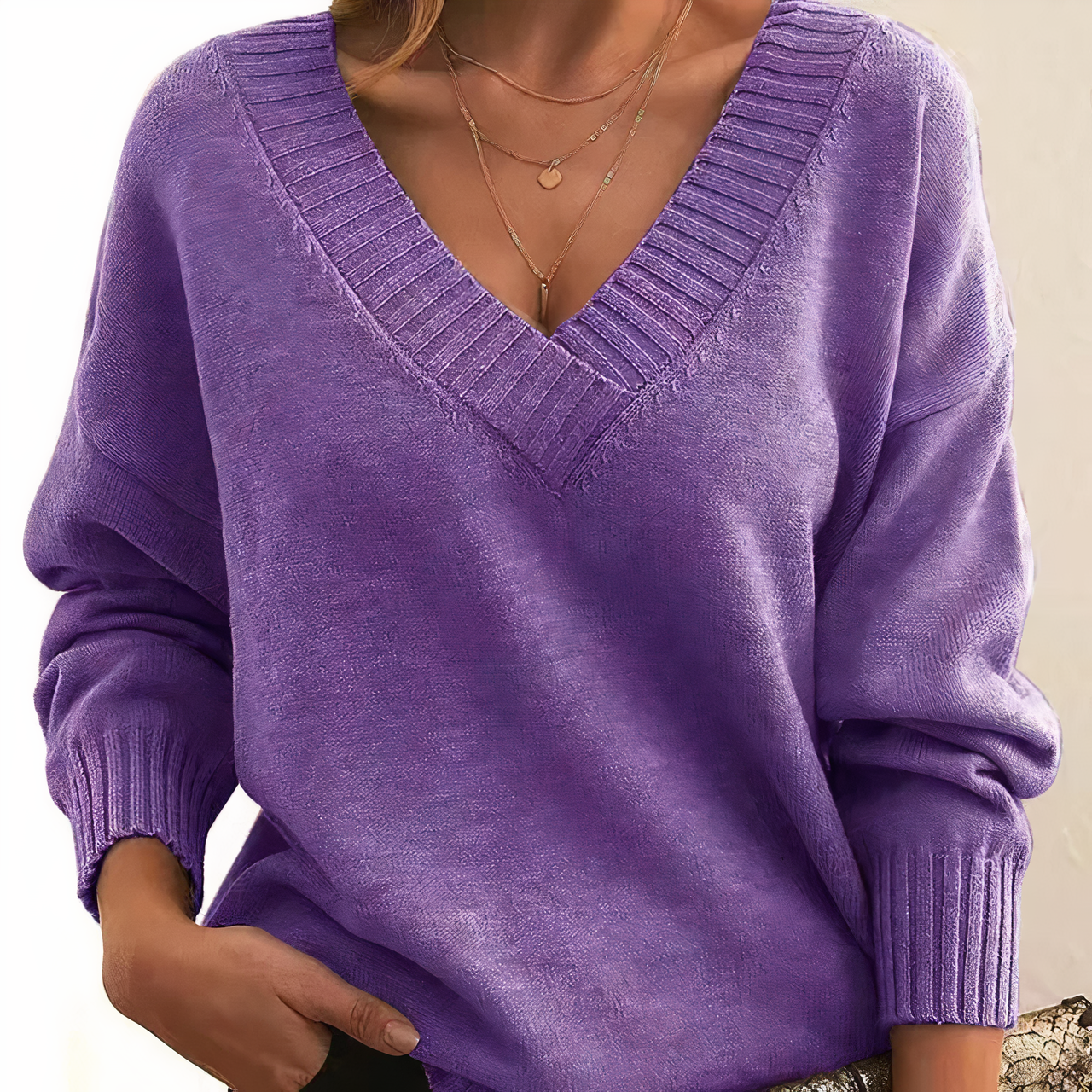 Lumina Wear Isabella lightweight V-neck sweater with relaxed fit and ribbed trims, shown in a soft, cozy fabric.